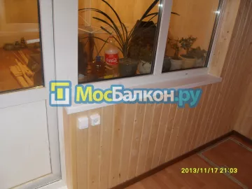Отделка балконов деревянной вагонкой в Москве