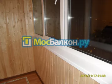 Отделка балконов деревянной вагонкой в Москве